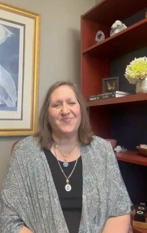 Leslie Lewis speaking on camera in a testimonial video about working with Sierra Media Productions.