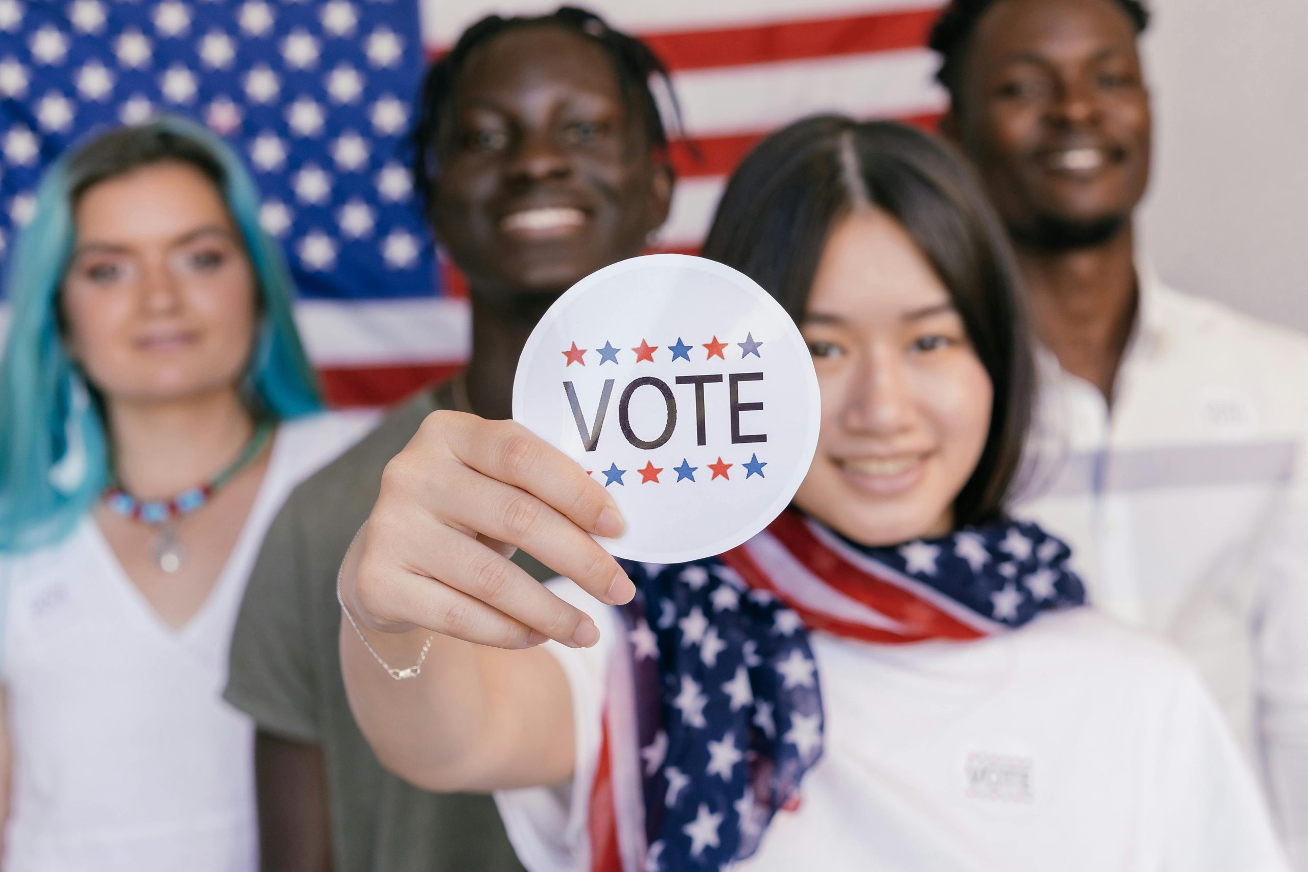 Younger millenials showcasing the importance of voting
