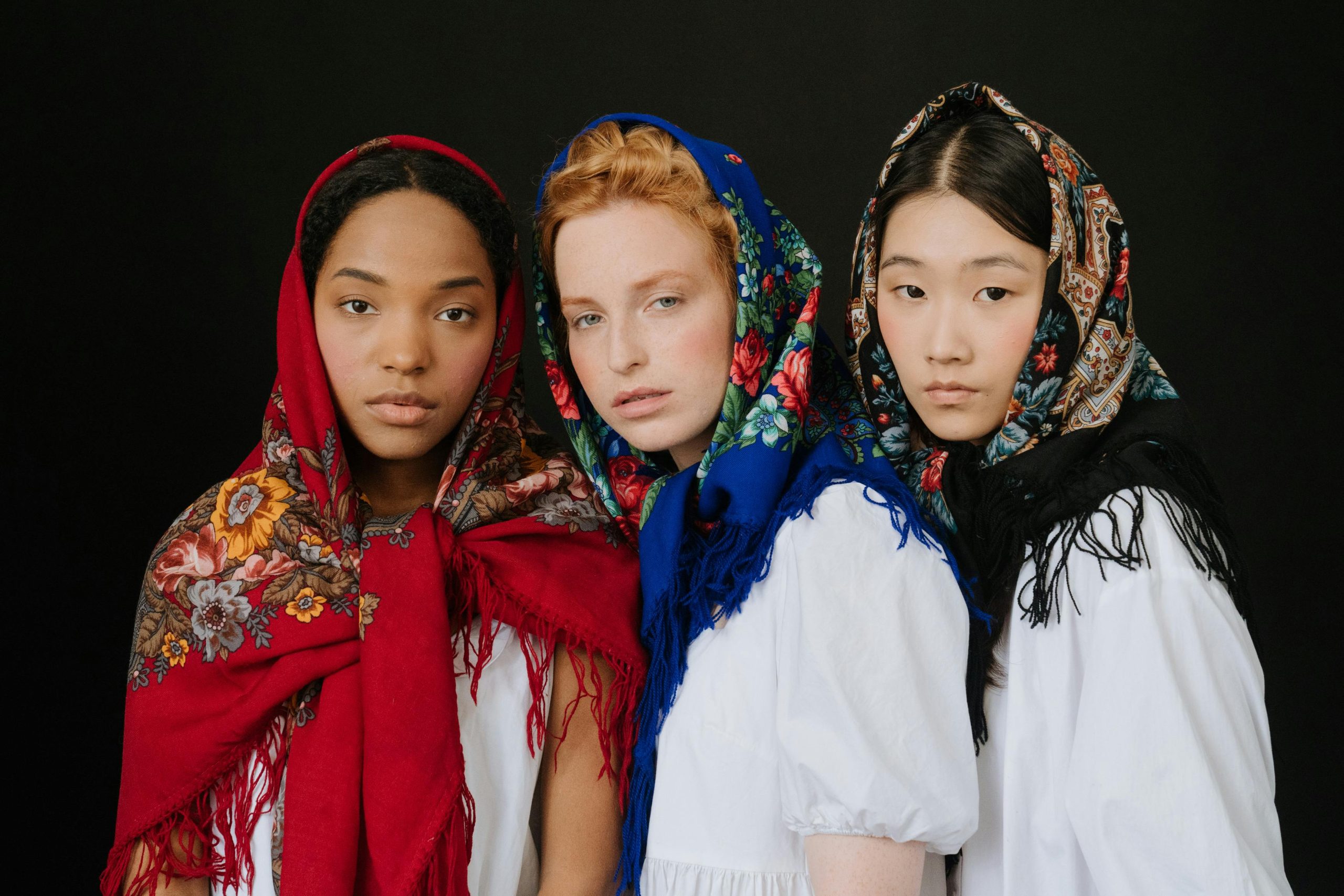 3 women of  diverse ethnicities are wearing headscarves and embracing culture in marketing